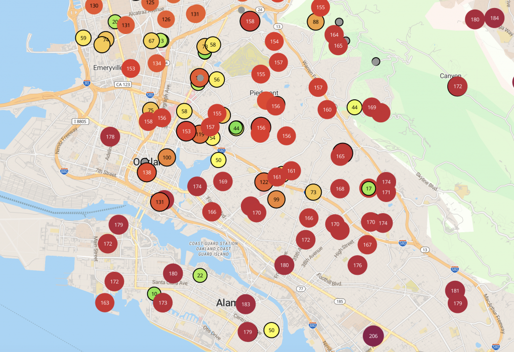 A Google map with various colored dots in Oakland showing the air quality is bad.