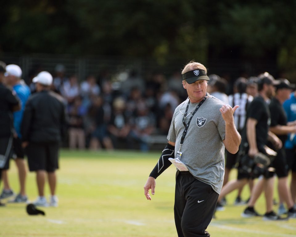 picture of Coach Gruden at training wearing visor