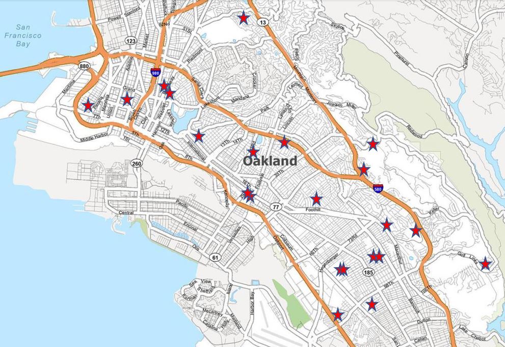 a map with red stars on different schools in Oakland.